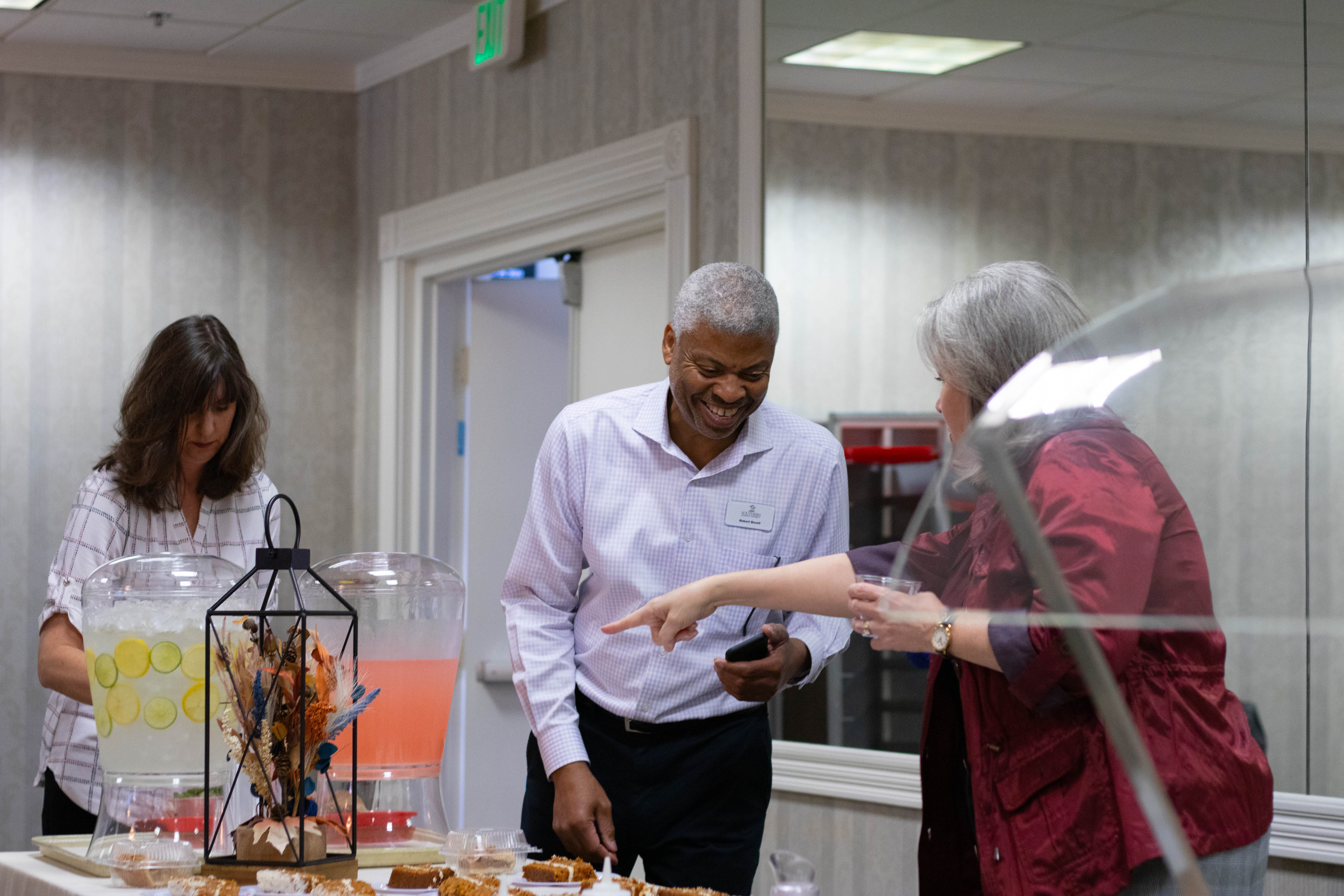 Two people chatting at a table