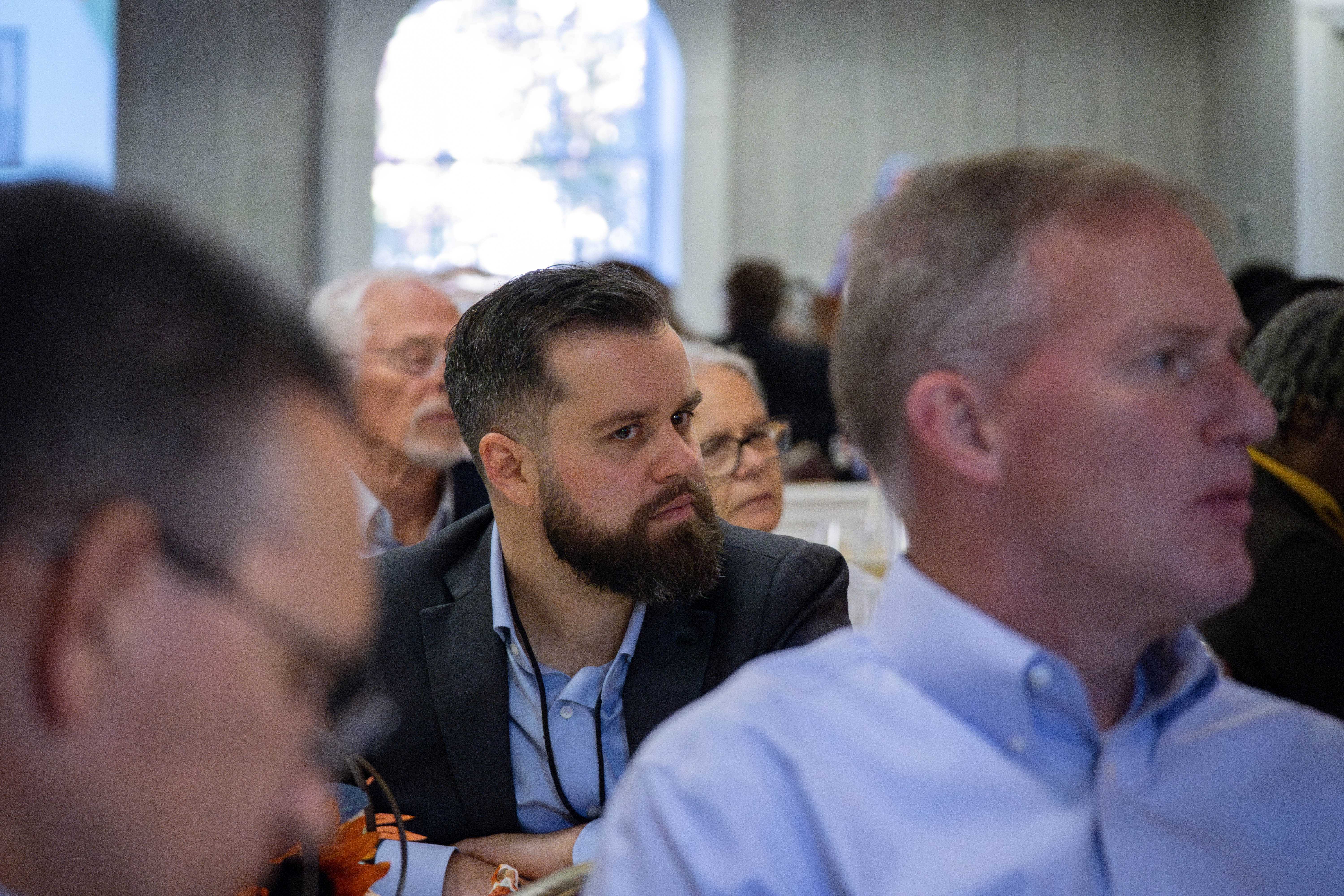 A person eating and listening