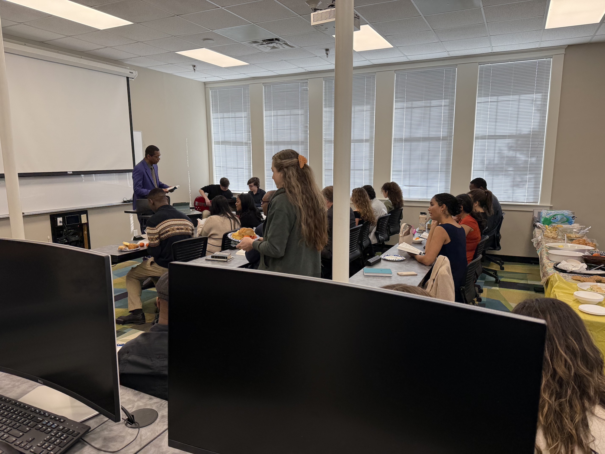 Getting ready to worship and sing songs.