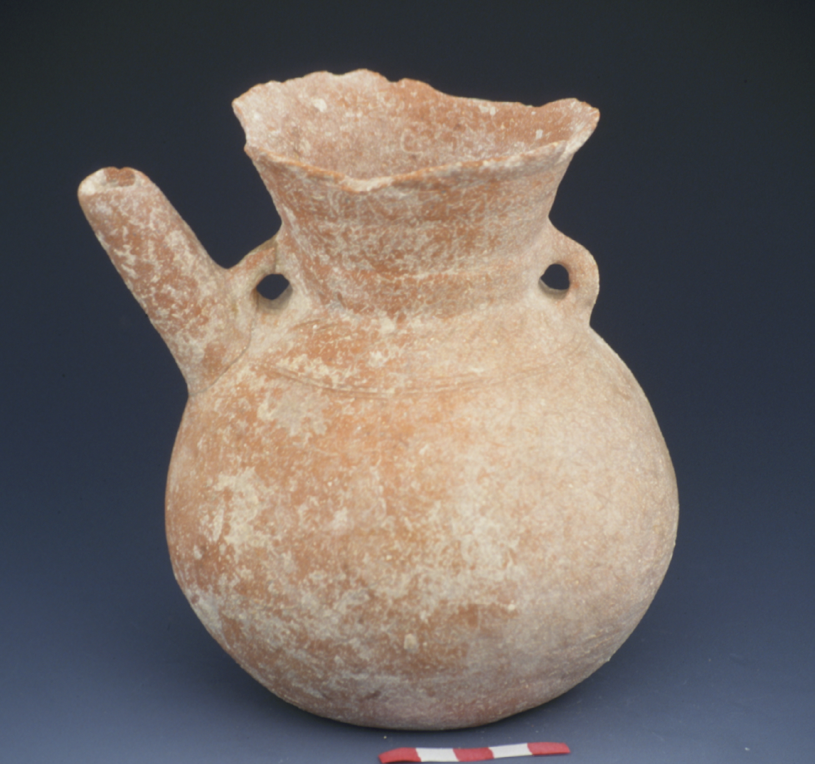 a tan amphoriskos 