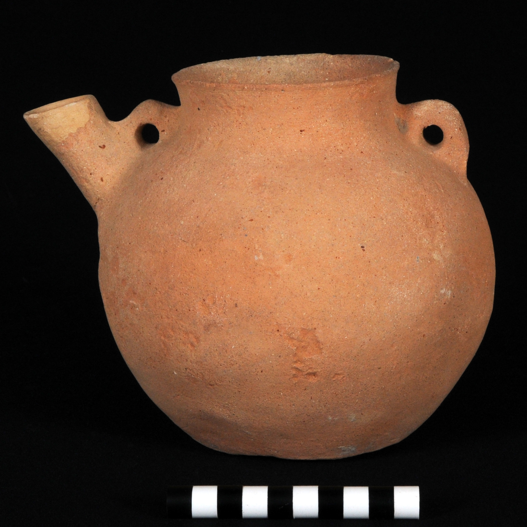 a light orange spouted amphoriskos 