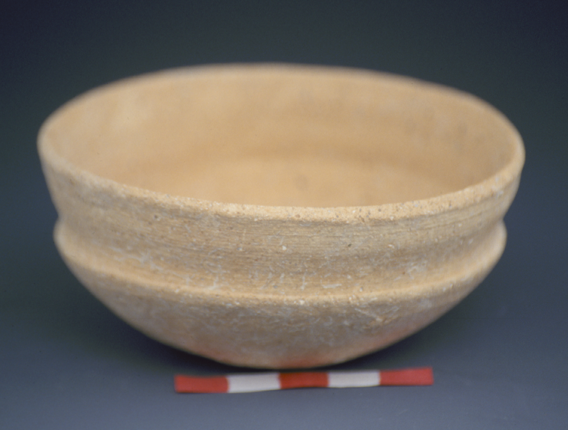 a tan carinated bowl