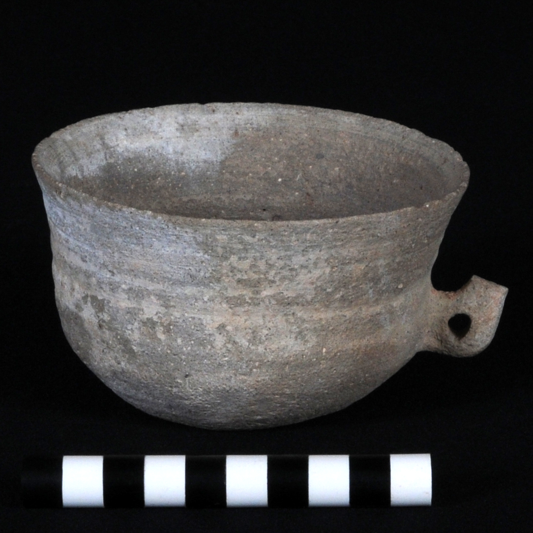a grey one-handled cup