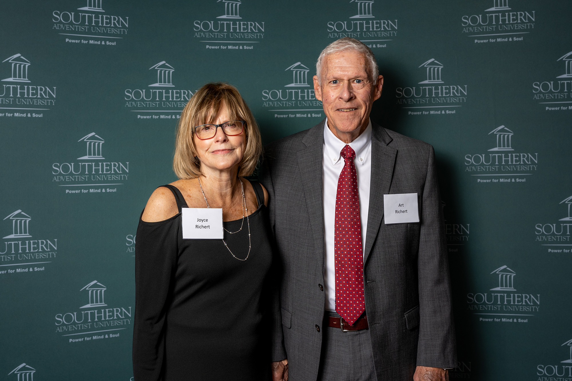 two people taking a photo