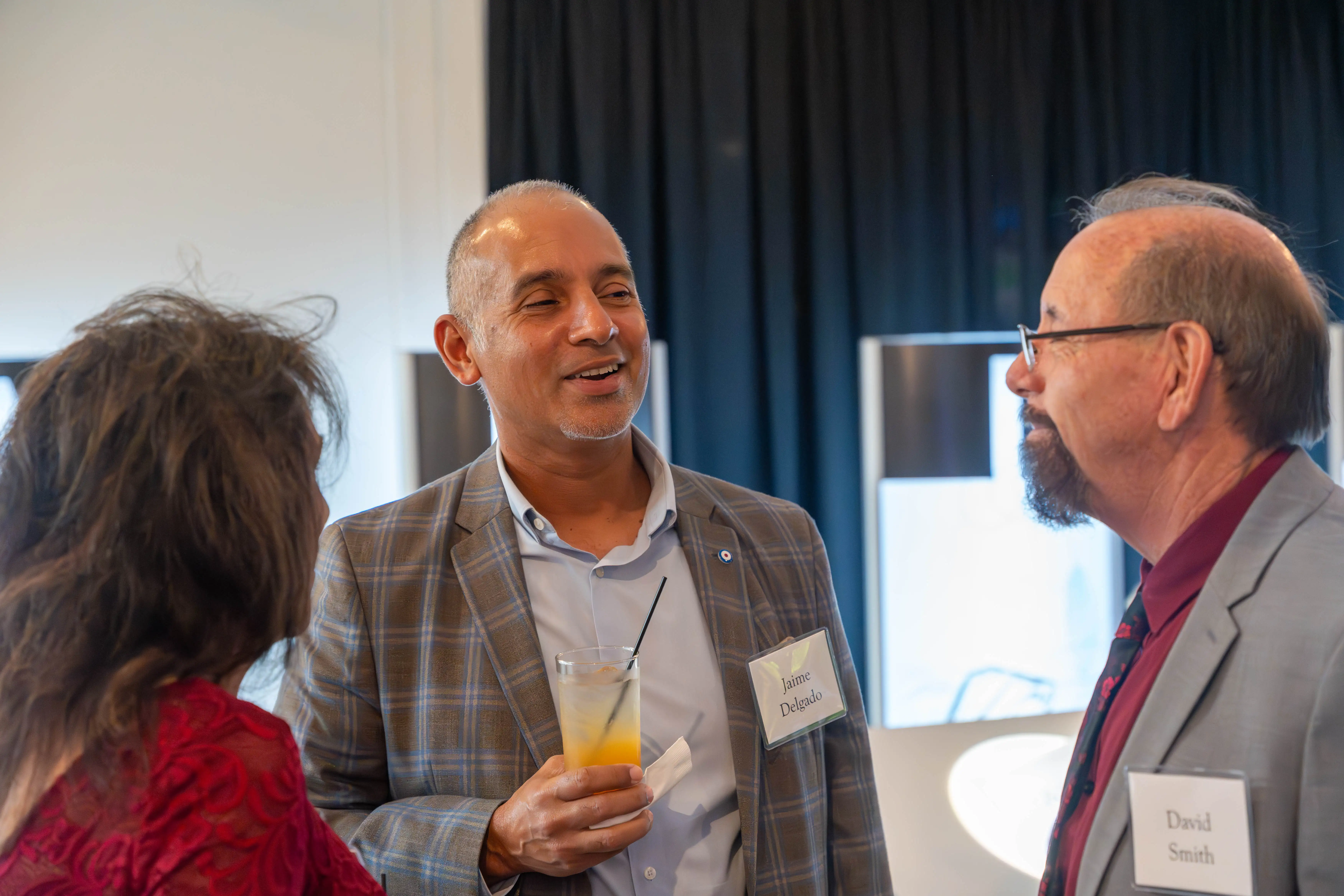 Phyllis Smith, Jaime Delgado, '05, and David Smith