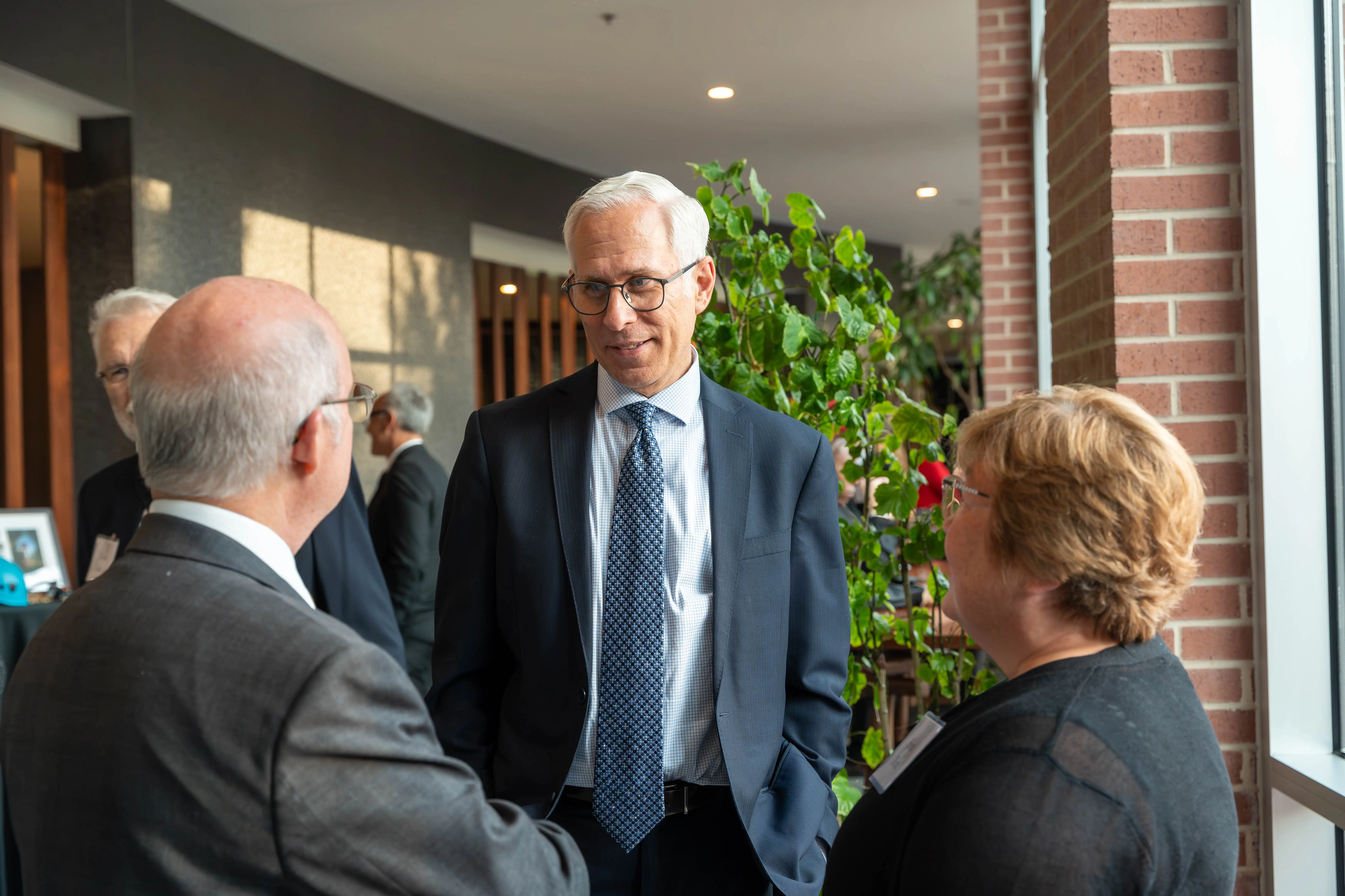 Steven Wrate, '85, Michael Hasel, and Sonia Wrate, '85