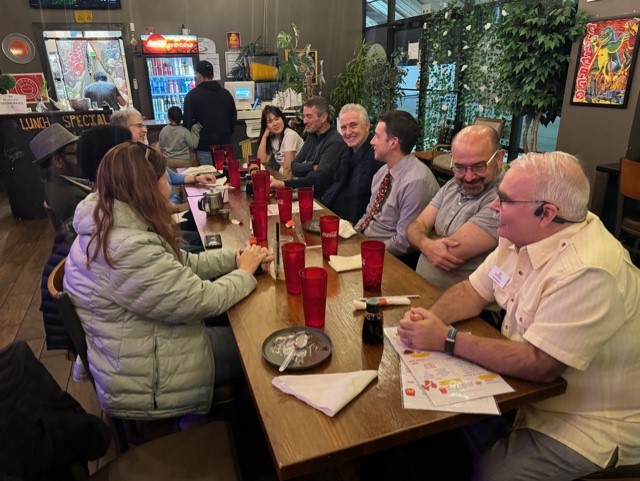 everyone sitting at a table